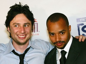 In this April 27, 2006, file photo, Zach Braff (L) and Donald Faison arrive at a third season DVD launch event and season five wrap party for the television series "Scrubs" at the Rain Nightclub inside the Palms Casino Resort in Las Vegas.