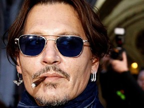 Actor Johnny Depp leaves the High Court in London, Britain, February 26, 2020.