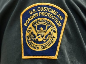 A U.S. Customs and Border Protection patch is seen on the arm of an agent in Mission, Texas on July 1, 2019. (REUTERS/Loren Elliott/File Photo)