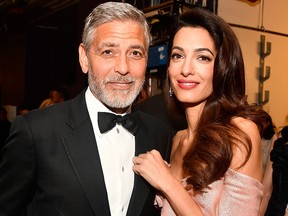 George Clooney (L) and Amal Clooney attend the American Film Institute's 46th Life Achievement Award Gala Tribute to George Clooney at Dolby Theatre  on June 7, 2018, in Hollywood, Calif.