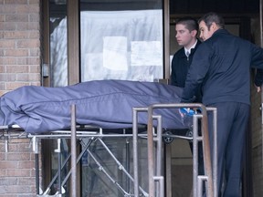 A body is removed from the long care home Yvon-Brunet in Montreal on Monday, April 13, 2020.