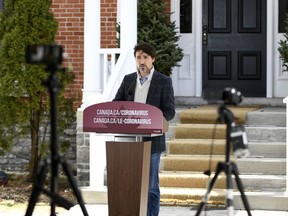 Prime Minister Justin Trudeau speaks during his daily press conference on the COVID-19 pandemic, in front of his residence at Rideau Cottage, Saturday, April 18, 2020.