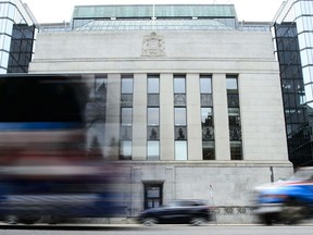 The Bank of Canada building in Ottawa is shown on May 16, 2019. The Bank of Canada says workers were feeling upbeat about job prospects, while employers felt otherwise in the weeks before COVID-19 delivered a shock to the Canadian economy.