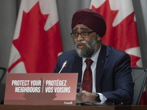 Minister of National Defence Harjit Sajjan speaks during a news conference in Ottawa, Monday March 30, 2020. The Royal Canadian Navy is pulling a number of ships back from overseas missions and imposing strict rules around social-distancing on board ship as the military prepares to respond to the COVID-19 pandemic.THE CANADIAN PRESS/Adrian Wyld