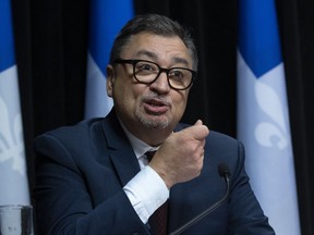 Horacio Arruda, Quebec director of National Public Health responds to reporters during a news conference on the COVID-19 pandemic, Thursday, April 16, 2020 at the legislature in Quebec City.