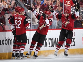 (L-R) Richard Panik, Jordan Oesterle, Clayton Keller and Alex Galchenyuk of the Arizona Coyotes celebrate after Panik scored a goal against the Ottawa Senators during the second period of the NHL game at Gila River Arena on Oct. 30, 2018, in Glendale, Ariz.