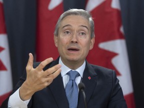 Minister of Foreign Affairs Francois-Philippe Champagne responds to a question during a news conference in Ottawa, Monday, March 9, 2020.