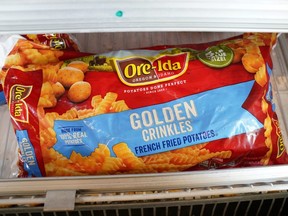 A bag of frozen french fries are seen on sale in a freezer case at a Safeway supermarket in Falls Church, Virginia, on Thursday, April 23, 2020.