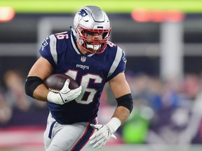 James Develin of the New England Patriots runs with the ball during the second half against the Minnesota Vikings at Gillette Stadium on December 2, 2018 in Foxborough, Massachusetts.