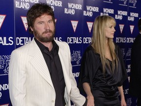 Actor Val Kilmer and actress Daryl Hannah attend the premiere of the film "Wonderland" at the Grauman's Chinese Theatre on September 24, 2003 in Hollywood, California. (Vince Bucci/Getty Images)