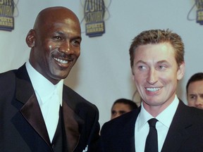 Basketball's Michael Jordan (L) and hockey's Wayne Gretzky arrive at Madison Square Garden in 1999, for the Sports Illustrated 20th Century Sports Awards.