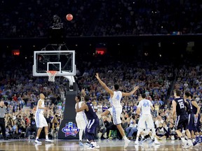 Kris Jenkins of the Villanova Wildcats shoots the game-winning three pointer to defeat the North Carolina Tar Heels 77-74 in the 2016 NCAA Men's Final Four National Championship game at NRG Stadium on April 4, 2016 in Houston, Texas. (Photo by Ronald Martinez/Getty Images)