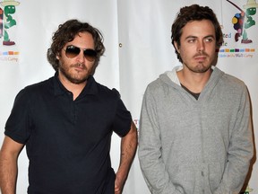 Actors Joaquin Phoenix, left, and Casey Affleck arrive at the reading of "The World Of Nick Adams" to honour Paul Newman held at Davies Symphony Hall on Oct. 27, 2008 in San Francisco, Calif.