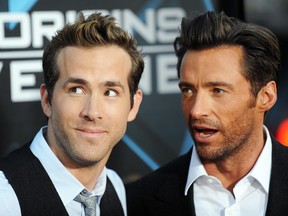 Cast members Ryan Reynolds, right, and Hugh Jackman arrive for the Los Angeles industry screening of "X-Men Origins-Wolverine" at Grauman's Chinese Theater in Hollywood, Calif., on April 28, 2009.