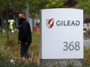 A sign is posted in front of the Gilead Sciences headquarters on April 29, 2020 in Foster City, California.
