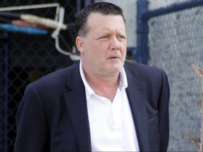 Hank Steinbrenner looks out onto the practice field during the New York Yankees workout at George M. Steinbrenner Field.