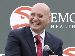 Atlanta Hawks general manager Travis Schlenk says he is not ready to let his players practice despite the state of Georgia beginning to re-open.