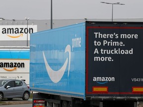 A truck with the logo of Amazon Prime Delivery arrives at the Amazon logistics center in Lauwin-Planque, northern France, March 19, 2020.
