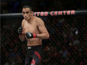 Tony Ferguson (red gloves) before fighting Donald Cerrone (blue gloves) during UFC 238 at United Center.