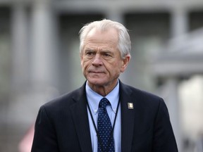 White House trade adviser Peter Navarro listens to a news conference about a presidential executive order relating to military veterans outside of the West Wing of the White House in Washington, U.S. March 4, 2019.