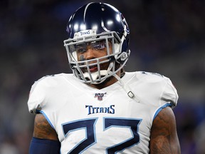 Derrick Henry of the Tennessee Titans warms up before the AFC Divisional Playoff game against the Baltimore Ravens at M&T Bank Stadium on Jan. 11, 2020, in Baltimore, Md.