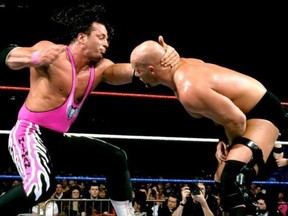 Bret Hart vs. Steve Austin in a submission match from WrestleMania 13. (WWE Photo)