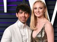 Joe Jonas (L) and Sophie Turner attend the 2019 Vanity Fair Oscar Party hosted by Radhika Jones at Wallis Annenberg Center for the Performing Arts on Feb. 24, 2019, in Beverly Hills, Calif.