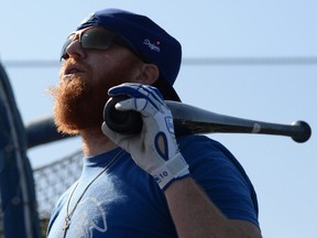 Los Angeles Dodgers third baseman Justin Turner looks on during a spring training workout at Camelback Ranch. (Joe Camporeale-USA TODAY Sports)