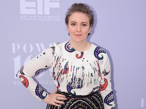 Lena Dunham poses on arrival for the Hollywood Reporter's Women in Entertainment Event on December 9, 2015 in Hollywood. (FREDERIC J. BROWN/AFP/Getty Images)