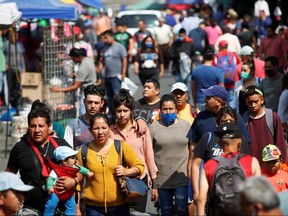 People are seen at El Salado market during the coronavirus outbreak in Mexico City, April 15, 2020. (REUTERS/Gustavo Graf)