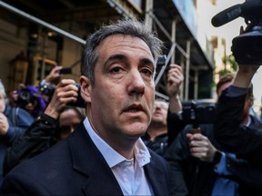 Michael Cohen, President Donald Trump's former lawyer, leaves his apartment to report to prison in Manhattan May 6, 2019. (REUTERS/Jeenah Moon/File Photo)