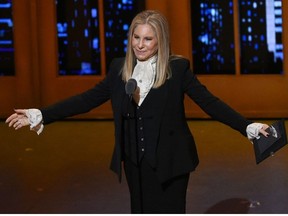 In this June 12, 2016 file photo, Barbra Streisand presents the award for best musical at the Tony Awards in New York. Streisand's 36th studio album, "Encore: Movie Partners Sing Broadway," is a compilation of Broadway duets with some of her friends and favorite actors, including Anne Hathaway, Daisy Ridley, Hugh Jackman, Chris Pine and Bradley Cooper.
