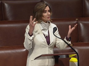 U.S. House Speaker Nancy Pelosi (D-CA) speaks ahead of a vote on a US$484-billion coronavirus relief bill on the floor of the U.S. House of Representatives inside the House Chamber of the U.S. Capitol, in this still image from video in Washington, D.C., AprIl 23, 2020.