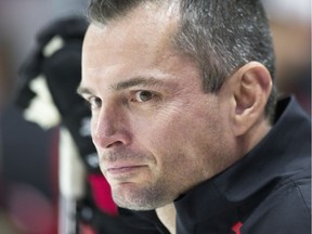 Goalie coach Pierre Groulx looks up ice as the Ottawa Senators practice at Canadian Tire Centre in advance of their season opener against the Leafs in Toronto.