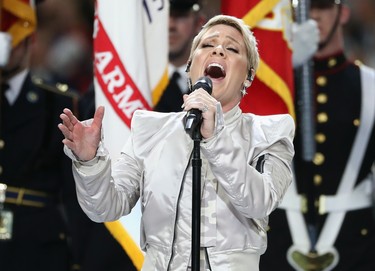 Pink sings the national anthem prior to Super Bowl LII between the New England Patriots and the Philadelphia Eagles at U.S. Bank Stadium on February 4, 2018 in Minneapolis. (Elsa/Getty Images)