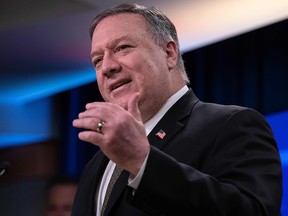 U.S. Secretary of State Mike Pompeo speaks at a press briefing at the State Department in Washington, D.C., on April 22, 2020.