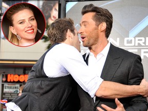 Hugh Jackman (L) said Ryan Reynolds' marriage to Scarlett Johansson (inset) led to their fake feud.