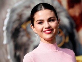 Cast member Selena Gomez poses at the premiere for the film "Dolittle" in Los Angeles January 11, 2020. (REUTERS/Mario Anzuoni)