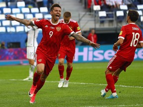 Fedor Smolov of Russia celebrates scoring his sides second goal during the FIFA Confederations Cup Russia 2017 Group A match between Russia and New Zealand at Saint Petersburg Stadium on June 17, 2017 in Saint Petersburg, Russia.