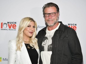 Tori Spelling (left) and Dean McDermott attend the Much Love Animal Rescue 3rd Annual Spoken Woof Benefit at Microsoft Lounge in Culver City, Calif., on Oct. 17, 2019.