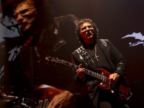 Black Sabbath guitarist Tony Iommi plays onstage at the Air Canada Centre in Toronto in 2013. (Jack Boland/Postmedia)
