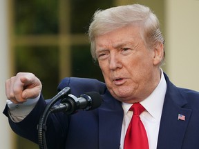 U.S. President Donald Trump takes questions from reporters during a news conference on COVID-19, in the Rose Garden of the White House in Washington, D.C., on April 27, 2020.