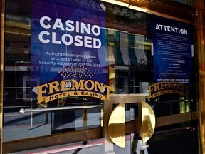 A closed sign is displayed at one of the entrances to the closed Fremont Hotel and Casino on April 25, 2020 in Las Vegas.