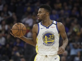 Golden State Warriors guard Andrew Wiggins dribbles the ball during a game in February. Wiggins told Sun sportswriter Ryan Wolstat that he's loving life in the Bay Area and with the Warriors.