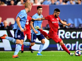 TFC's Alejandro Pozuelo kicks the ball during last year's playoff game against New York City FC.