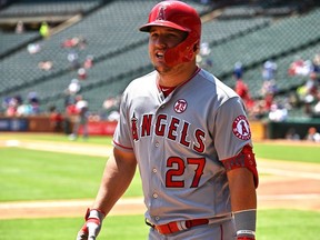 Mike Trout of the Los Angeles Angels reacts after his two-run home run in the top of the first inning during game one of a doubleheader against the Texas Rangers at Globe Life Park in Arlington on August 20, 2019 in Arlington, Texas.