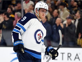 Andrew Copp of the Winnipeg Jets reacts after a Boston Bruins goal during the first period at TD Garden on Jan. 9, 2020, in Boston.
