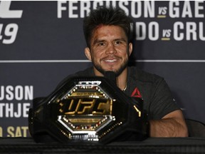 Henry Cejudo of the United States speaks to the media after his bantamweight title fight against Dominick Cruz of the United States during UFC 249 at VyStar Veterans Memorial Arena on May 09, 2020 in Jacksonville, Florida.
