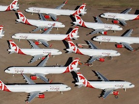 Decommissioned and suspended Air Canada commercial aircrafts are seen stored in Pinal Airpark on May 16, 2020 in Marana, Arizona.