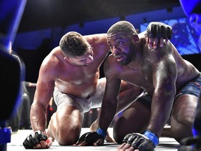 Alistair Overeem (L) of the Netherlands consoles Walt Harris of the United States after their Heavyweight bout during UFC Fight Night at VyStar Veterans Memorial Arena on May 16, 2020 in Jacksonville, Florida.